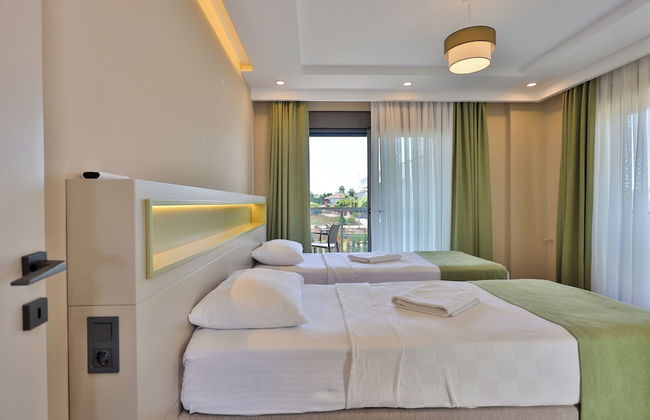 Nirvana Holiday Homes - Foto 9