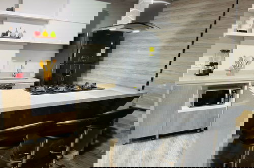 Photo 36 - SUITES H&A 911