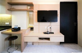 Foto 2 - Compact And Comfy Studio At Puri Mas Apartment