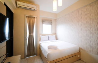 Foto 3 - Compact And Comfy Studio At Puri Mas Apartment