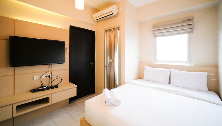 Photo 1 - Compact And Comfy Studio At Puri Mas Apartment