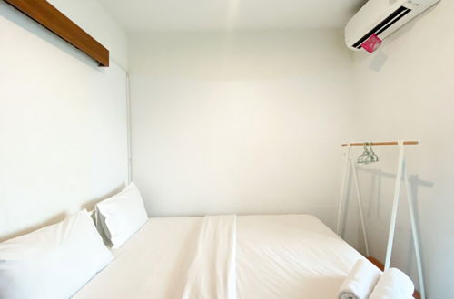 Photo 6 - Modern And Homey Studio At Grand Kamala Lagoon Apartment