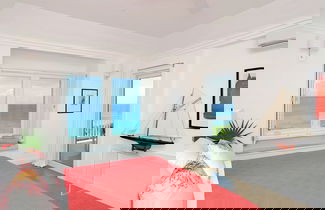 Photo 1 - Coastal Haven: Charming Beachfront Cottage With Pool