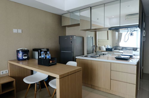 Photo 5 - Good Choice Studio Apartment At Tamansari La Grande