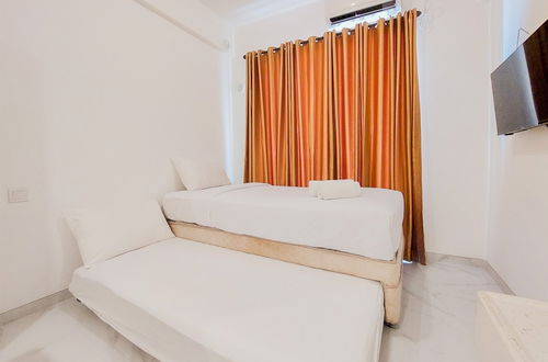 Photo 4 - Cozy Stay And Homey Studio Room Sky House Bsd Apartment