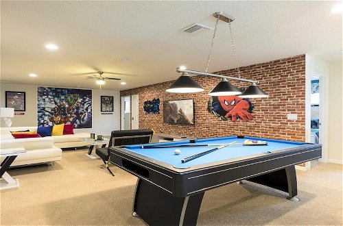 Foto 4 - Modern 8BR Home With Pool SPA Game Room Theme Room