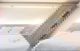 Photo 3 - Comfort And Minimalist Studio At Amethyst Apartment