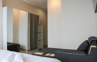 Photo 3 - Homey And Minimalist 1Br At Menara Jakarta Kemayoran Apartment