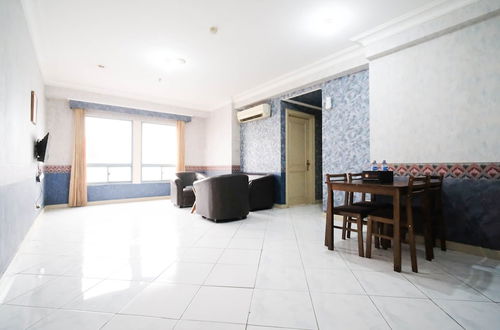 Photo 1 - Best Deal And Homey 2Br At Taman Beverly Apartment