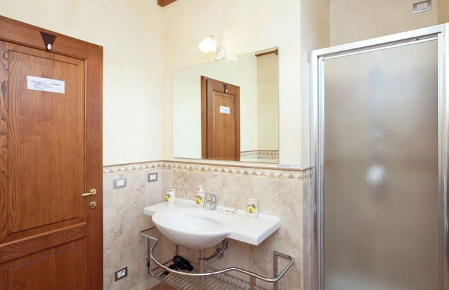 Tuscan Style Apartment with View of the Hills - Photo 13