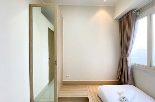 Photo 9 - Cozy And Minimalist 2Br At 8Th Floor The Oasis Cikarang Apartment