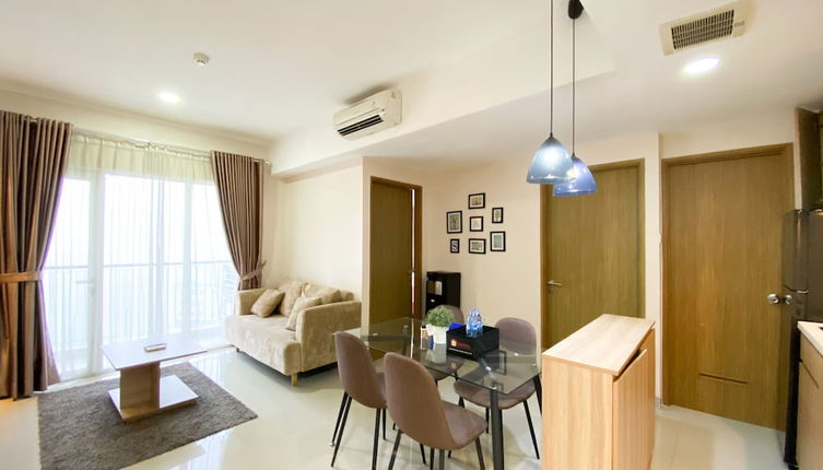 Foto 1 - Cozy And Minimalist 2Br At 8Th Floor The Oasis Cikarang Apartment