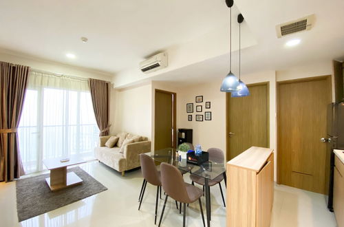 Foto 1 - Cozy And Minimalist 2Br At 8Th Floor The Oasis Cikarang Apartment