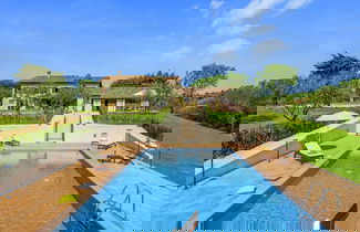 Foto 1 - Inviting Holiday Home in San Costanzo With Swimming Pool