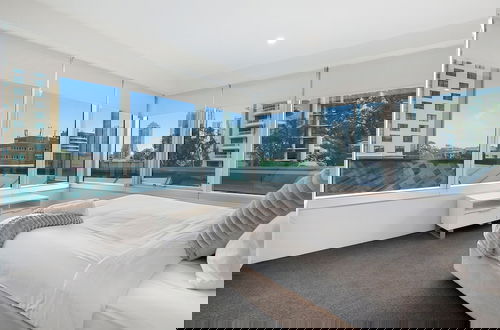 Foto 8 - Private Q Tower Apartments - Wow Stay