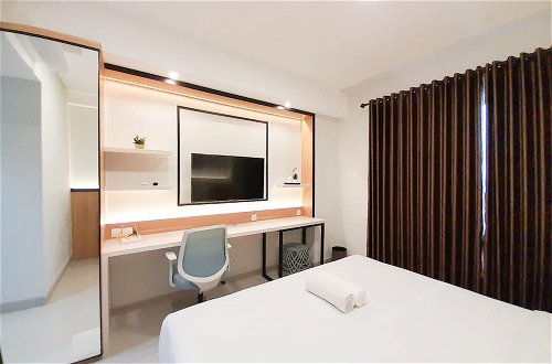Photo 1 - Cozy Designed Studio At Patraland Amarta Apartment