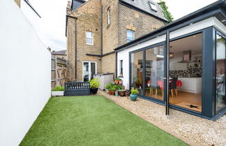 Photo 2 - Delightful Family Home With Garden in Balham by Underthedoormat