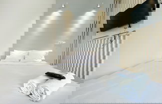 Foto 3 - Homey And Elegant Studio Vasanta Innopark Apartment