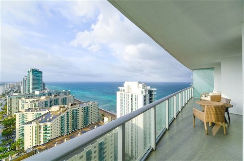 Photo 19 - Luxury Condo Steps Away from the Beach