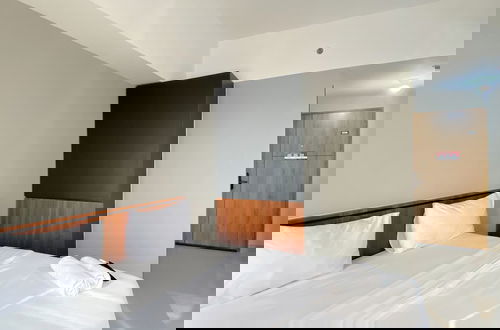 Foto 4 - Homey and Minimalist Studio LRT City Jatibening Apartment