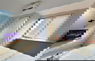 Foto 3 - Homey and Minimalist Studio LRT City Jatibening Apartment
