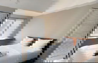 Foto 2 - Homey and Minimalist Studio LRT City Jatibening Apartment