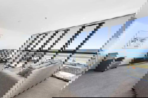 Foto 14 - Oceanfront at Rhapsody by Coastal Letting Co