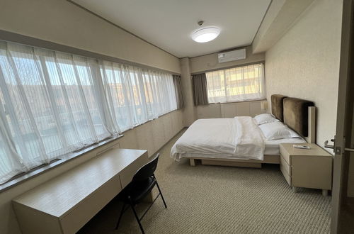 Photo 4 - Beijing Jiuxian Apartment