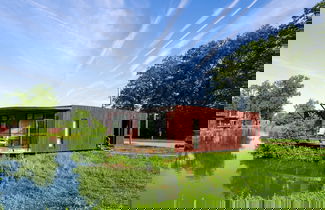 Foto 1 - Lake Bungalow With Terrace by Belvilla