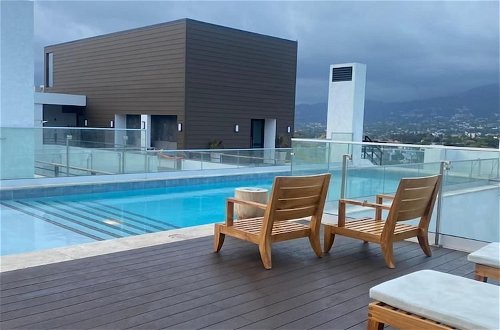 Photo 9 - Comfy Studio with rooftop pool