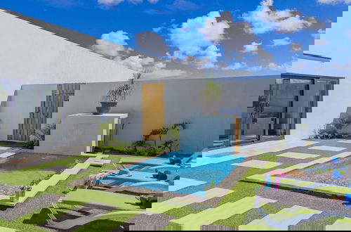 Photo 47 - Brand NEW 3BR w Private Pool Walk to Palm Beach