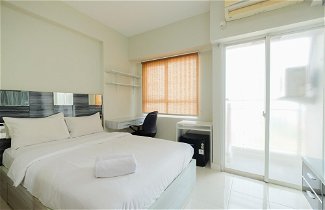 Photo 2 - Homey And Warm Studio Room At Taman Melati Margonda Apartment