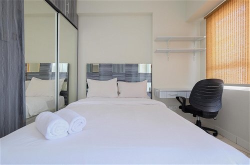 Photo 1 - Homey And Warm Studio Room At Taman Melati Margonda Apartment