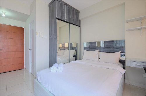 Photo 4 - Homey And Warm Studio Room At Taman Melati Margonda Apartment