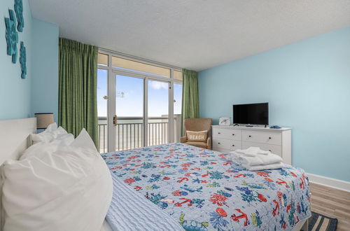 Photo 11 - Hosteeva | 2-BR Oceanfront Views w Pool | Atlantica Towers Condo