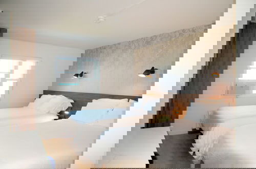 Photo 40 - Uptown Inn by Vantaggio - Limited Service Apart-Hotel