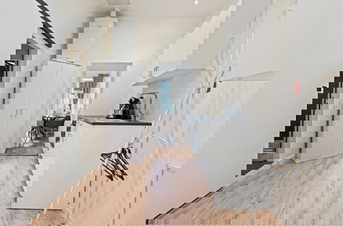 Foto 1 - Cozy City Apartments