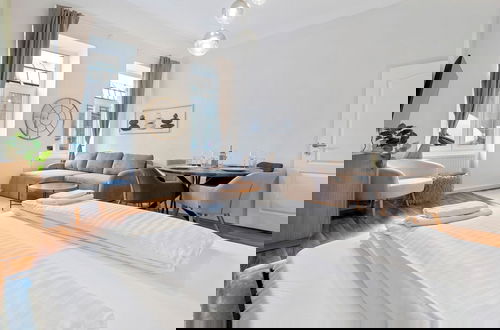 Foto 12 - Cozy City Apartments