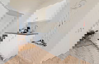 Foto 2 - Cozy City Apartments