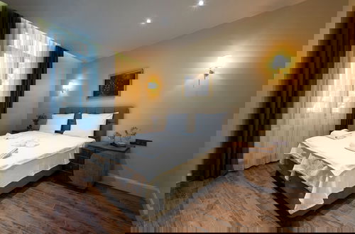 Photo 13 - Level Suites