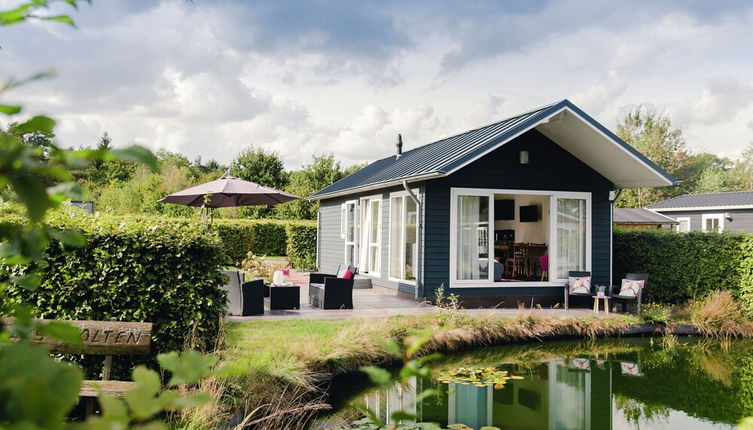 Photo 1 - Beautiful Chalet in a Holiday Park by a Pond