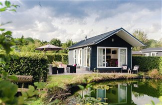 Photo 1 - Beautiful Chalet in a Holiday Park by a Pond