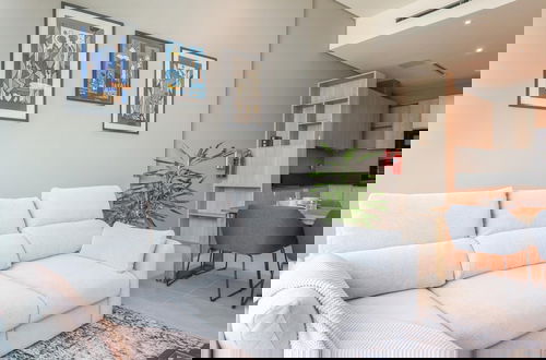 Photo 18 - Elite LUX Holiday Homes - Luxurious 1BR Suite in Signature Livings JVC - Dubai