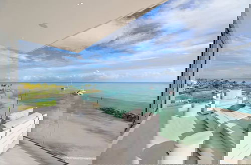 Foto 6 - Luxury 4-bedroom Oceanfront Oasis