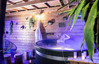 Foto 1 - Appart Hotel GLAM88 Suites SPA et SAUNA